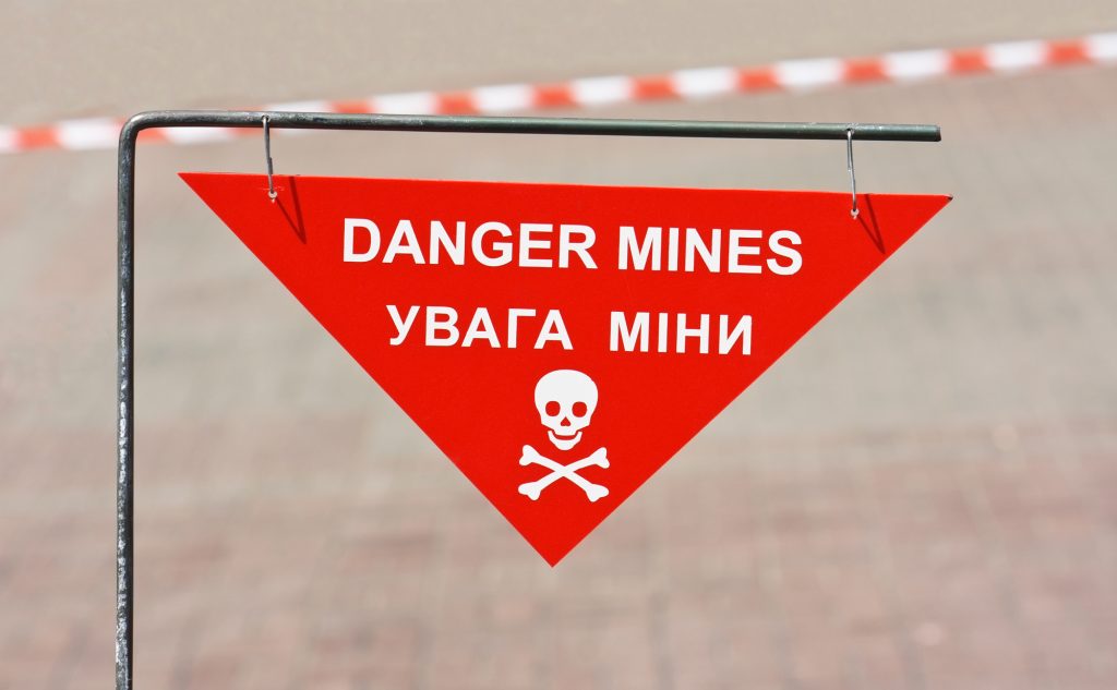 Awarning sign on mined area
