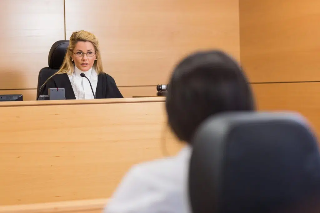 Lawyer listening to the judge in the court room