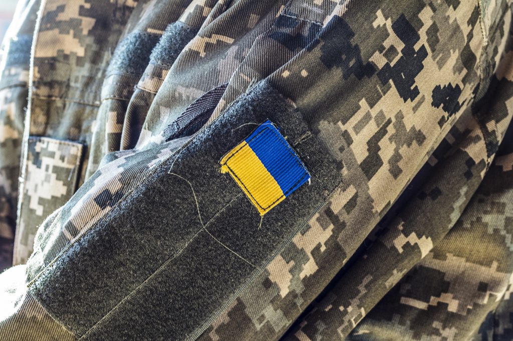 Closeup of military uniform surface.