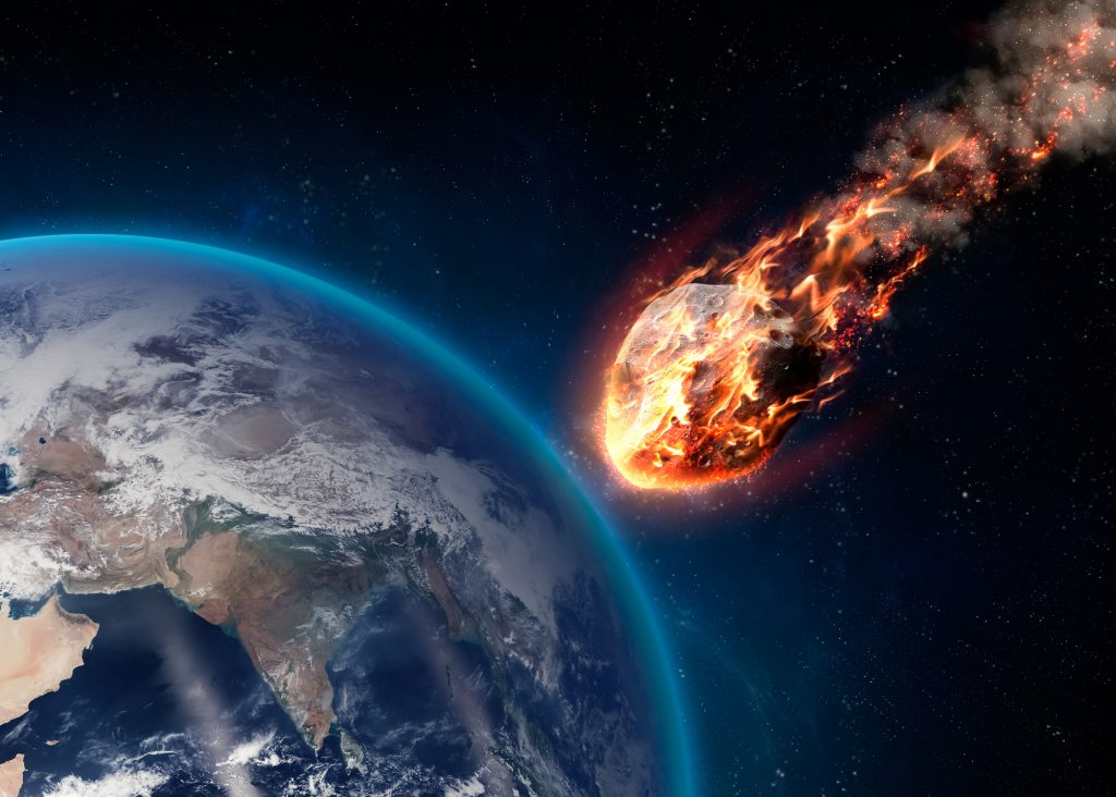A Meteor glowing as it enters the Earth's atmosphere. Elements of this image furnished by NASA