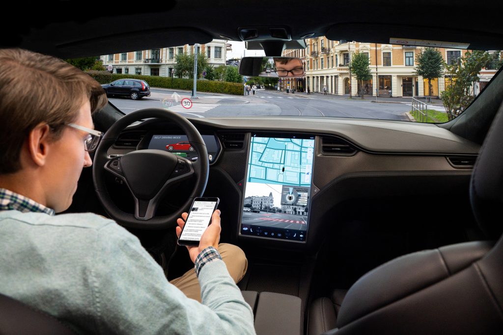 The car is driving on autopilot