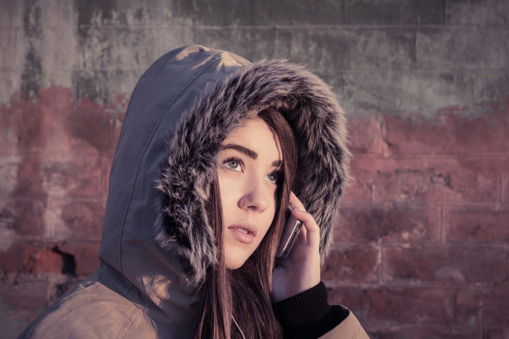 Portrait of a teenage girl outdoor wearing winter coat