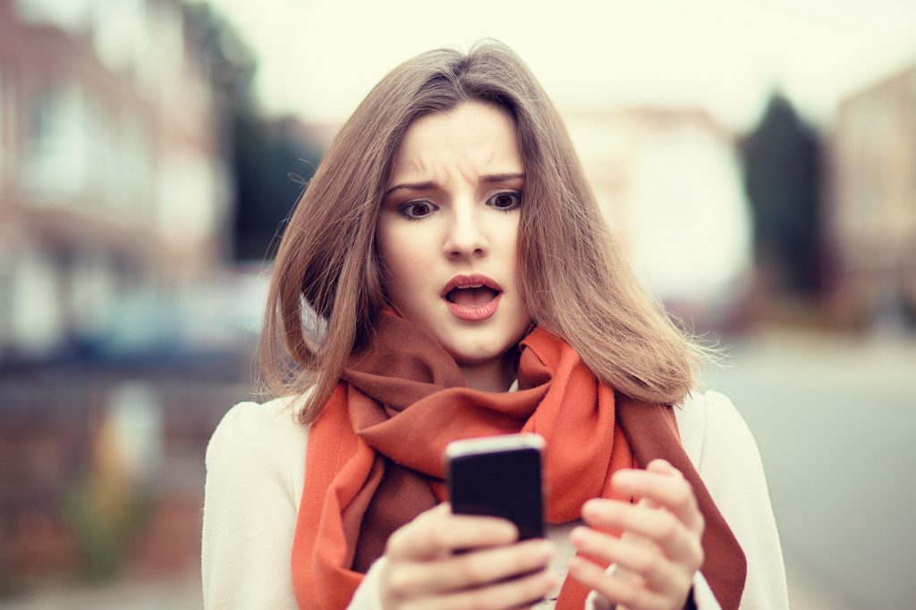 Bad news, comment in social media. Young woman