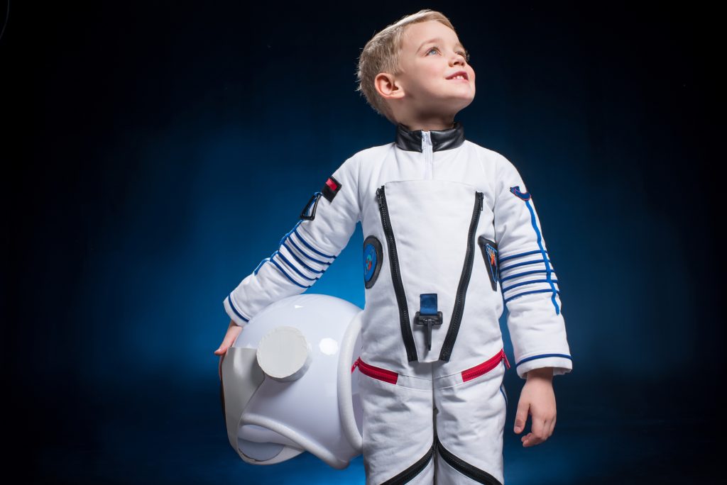 A child in an astronaut suit
