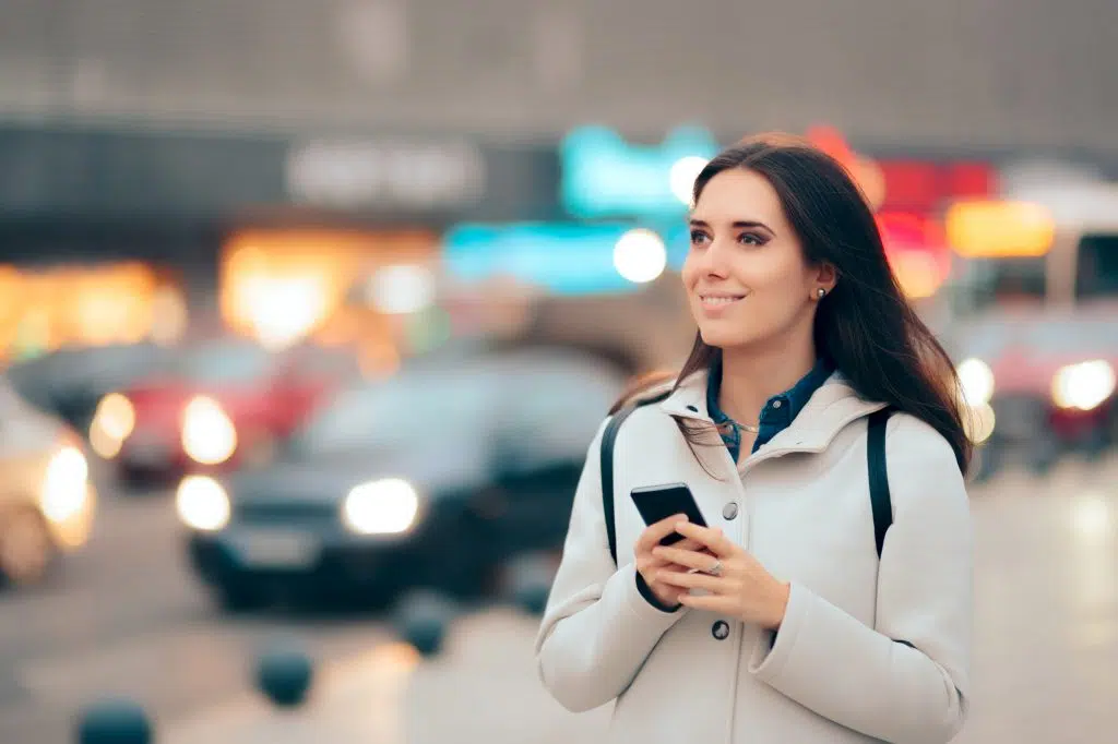 Happy woman with a smartphone