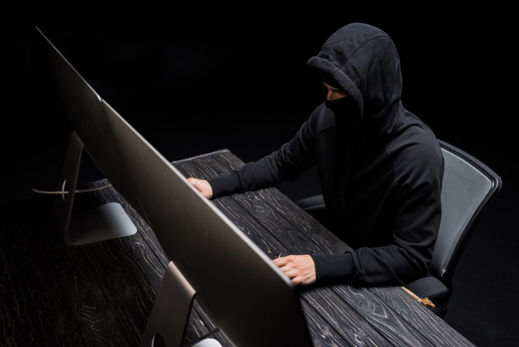 Man Working With Computer And Laptop