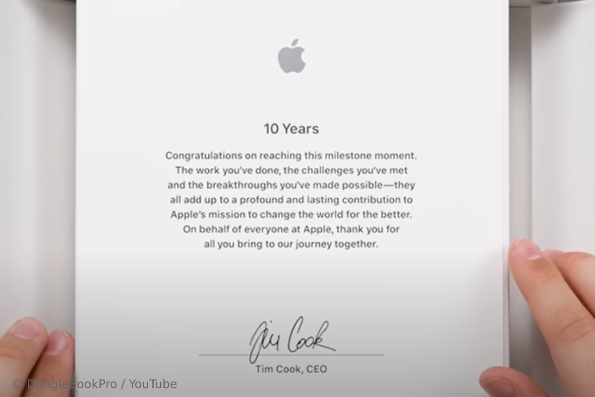Screenshot from the video of unwrapping a gift from Apple in honor of the 10th anniversary of working for the company