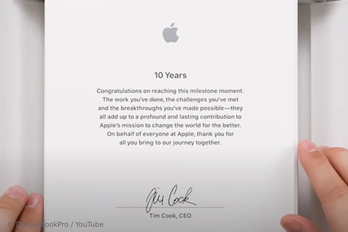 Screenshot from the video of unwrapping a gift from Apple in honor of the 10th anniversary of working for the company