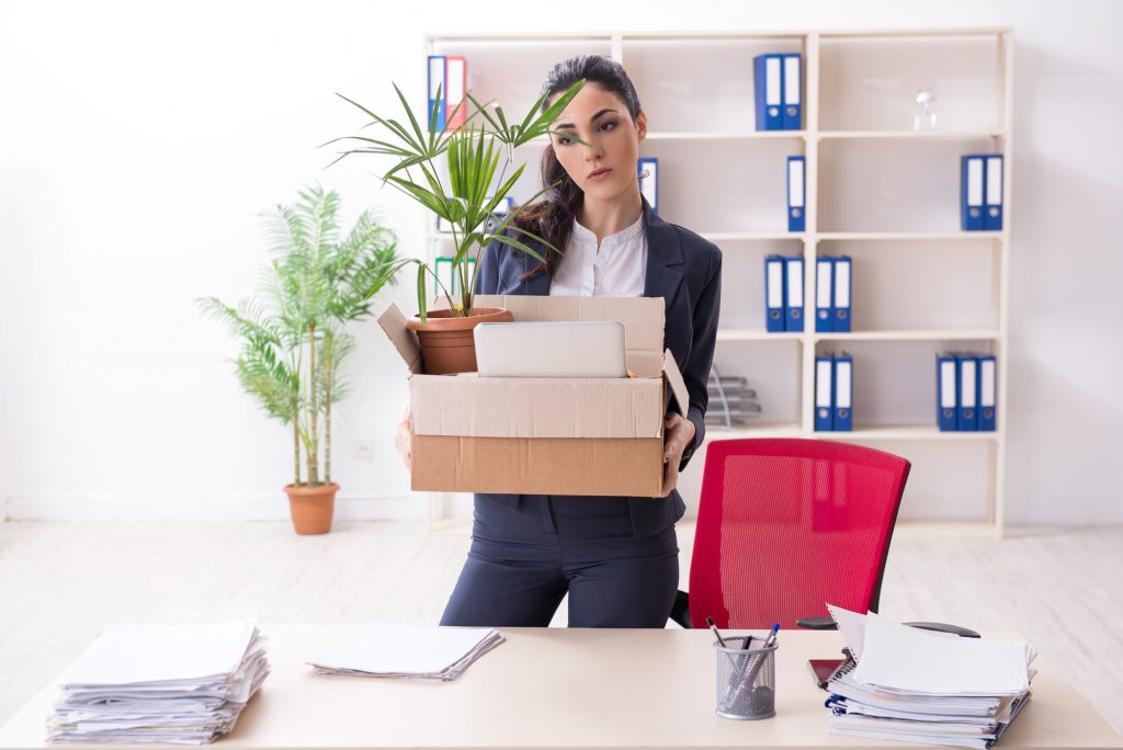 Young female employee being fired from her work