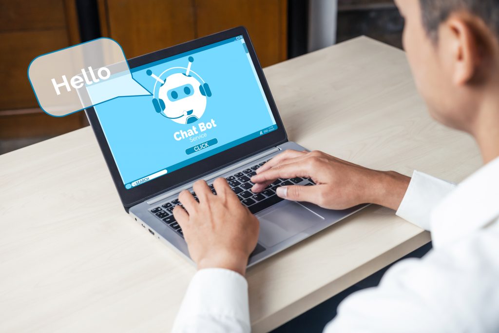 AI Chatbot smart digital customer service application concept. Computer or mobile device application using artificial intelligence chat bot automatic reply online message to help customers instantly.