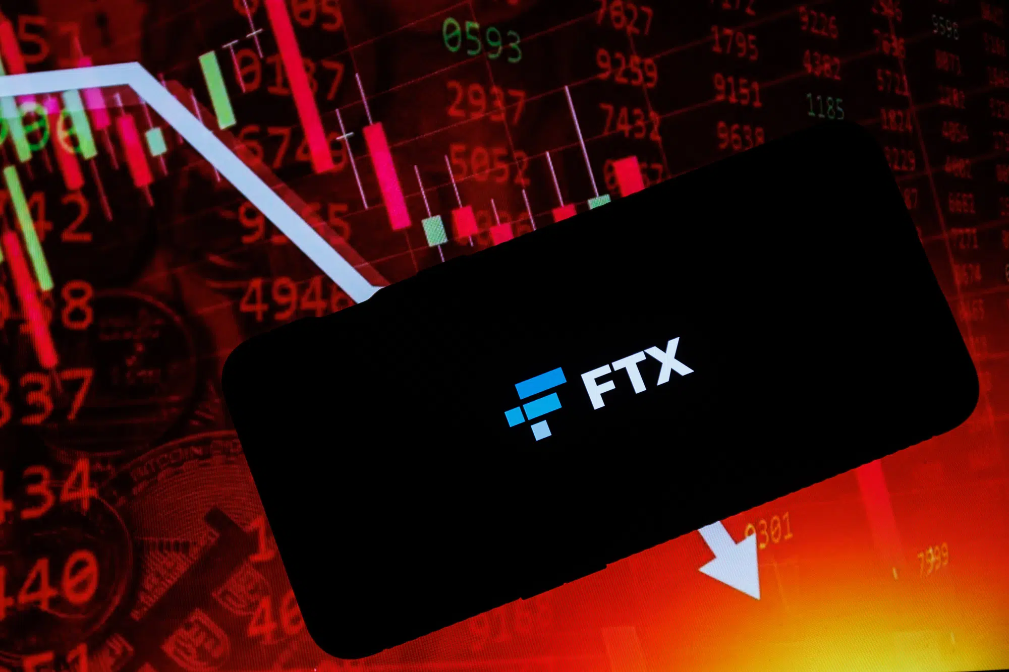 FTX company logo in stock background. FTX Trading Ltd., commonly known as FTX is a bankrupt company that formerly operated a cryptocurrency exchange . High quality photo