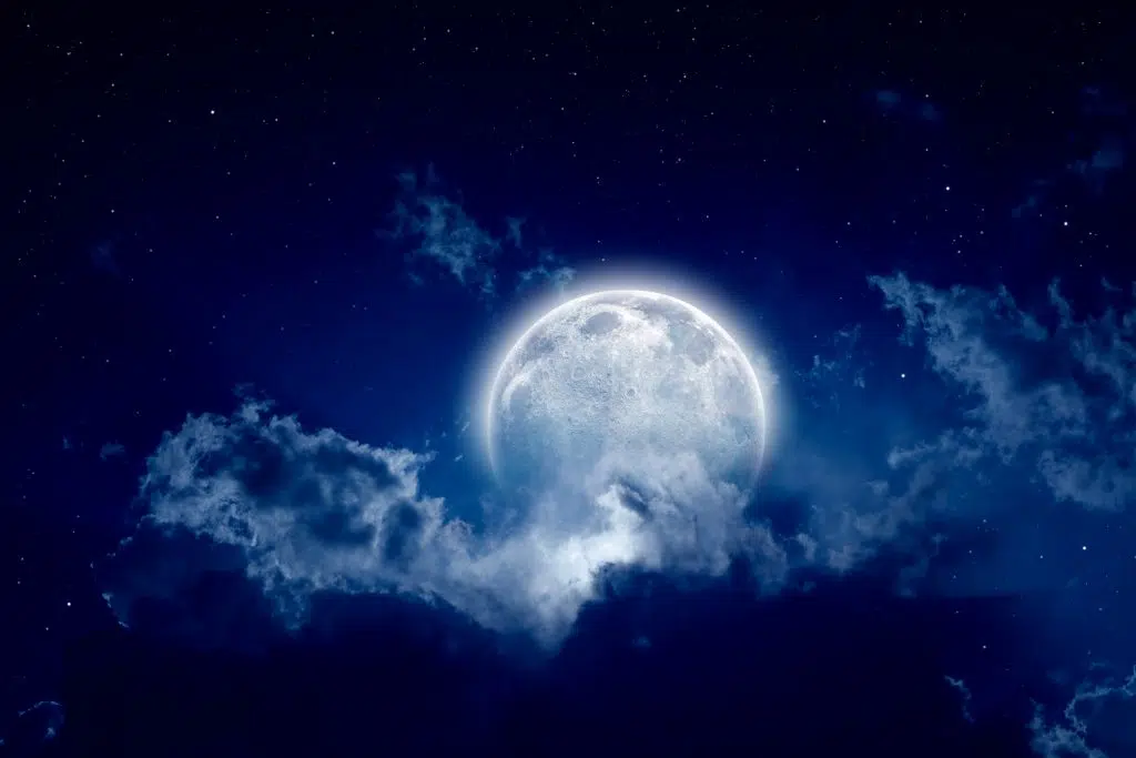 Peaceful background, night sky with full moon, stars, beautiful clouds. Elements of this image furnished by NASA