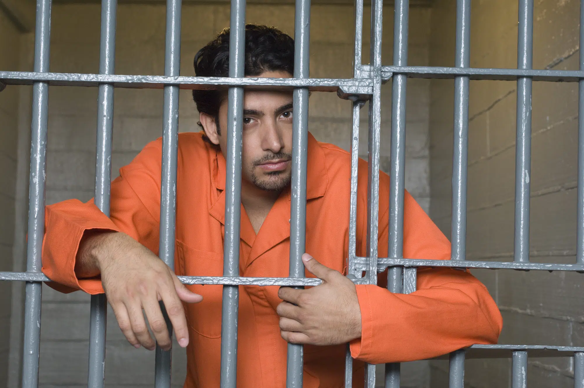 Portrait of prisoner in jail