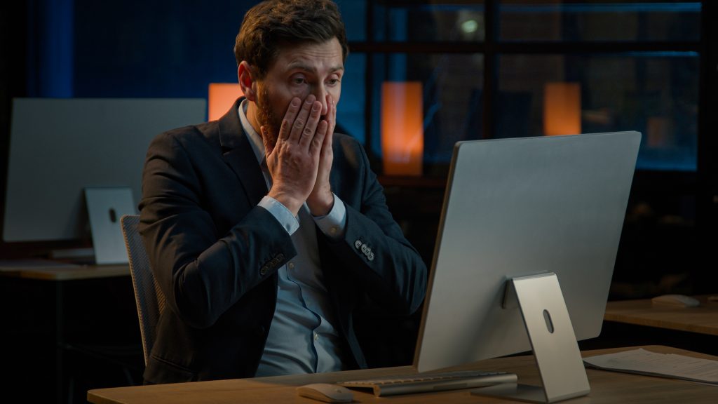 Frustrated stressed businessman work in evening office Caucasian middle-aged man fail lose online project on computer lost business bankruptcy failure lost job desperate anxious male losing problem. High quality 4k footage