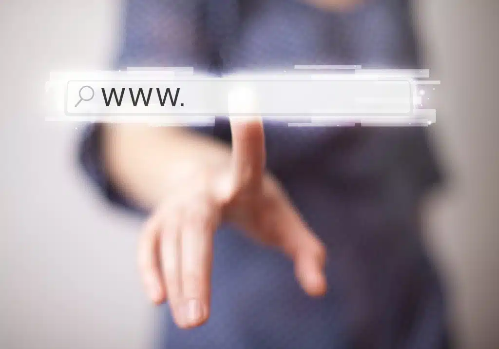 Young woman touching web browser address bar with www sign
