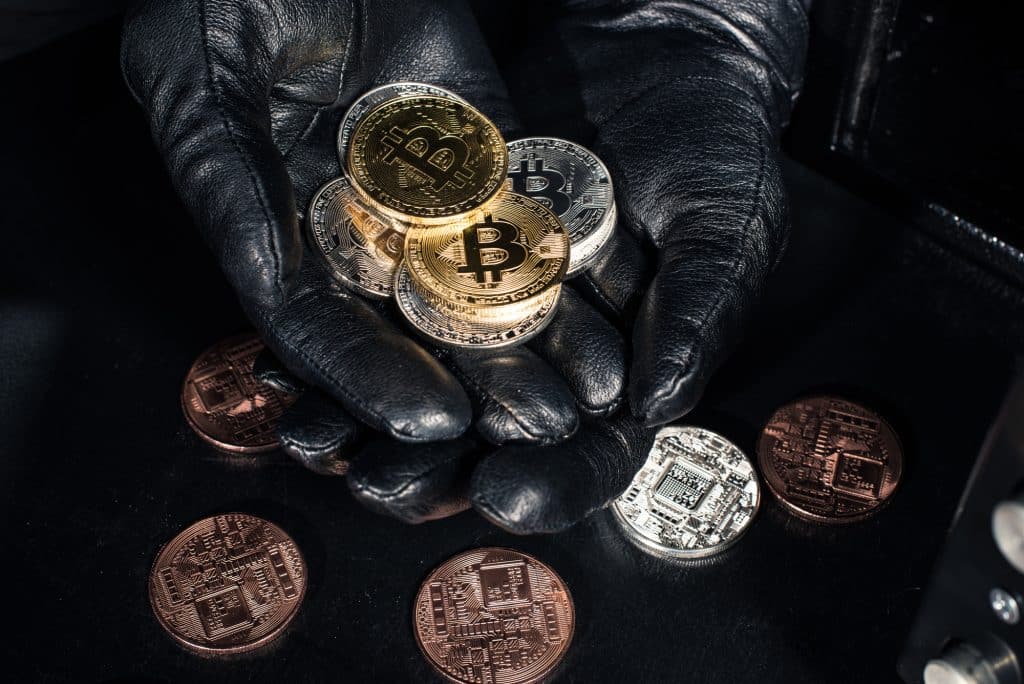 Illegal transactions with cryptocurrencies, photo concept