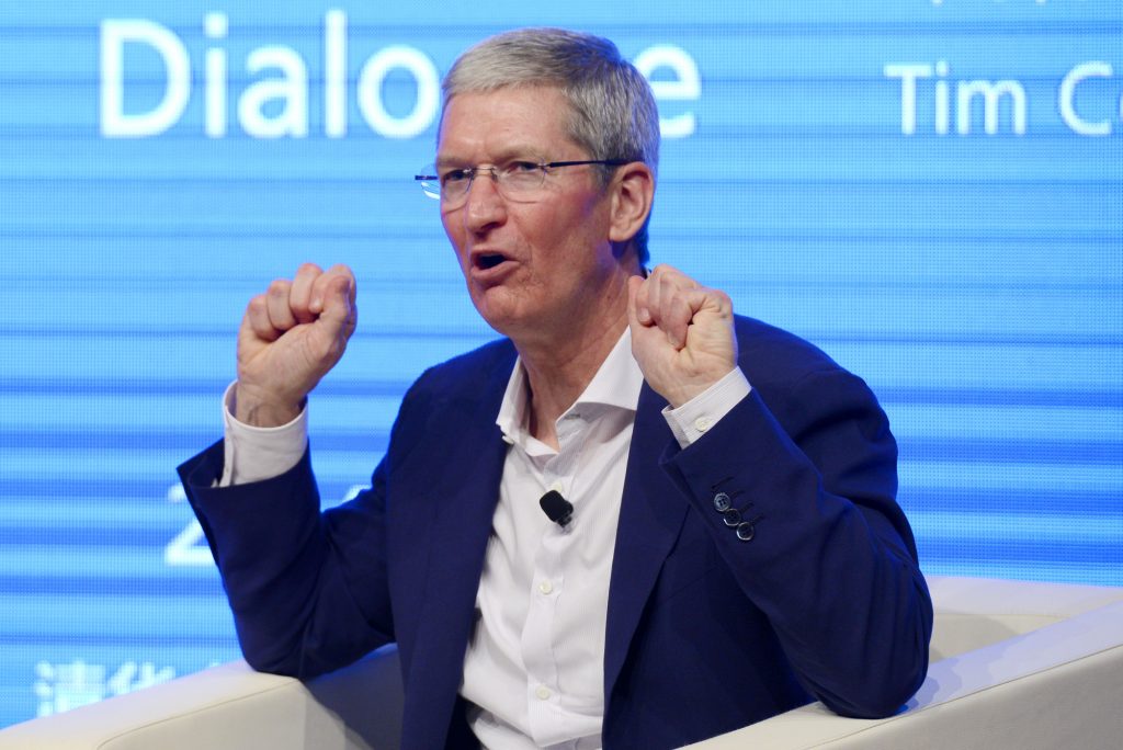 Tim Cook, CEO of Apple Inc., speaks at a dialogue with Qian Ying, dean of the School of Economics and Management (SEM), during the Tsinghua Management Global Forum at Tsinghua University in Beijing, China, 23 October 2014. Tim Cook attended a dialogue with Qian Ying, dean of the School of Economics and Management, at Beijing's Tsinghua University on Thursday (23 October 2014). Cook is visiting China, where he has toured Foxconn Technology Co's iPhone factory in Zhengzhou and looked at local retail operations. On Wednesday, Cook met with China's Vice Minister Ma Kai, where the two exchanged views on "protection of users' information" as well as "strengthening cooperation," according to the official Xinhua News Agency. The Apple chief also said the company is cooperating with Chinese firms including Baidu Inc and Alibaba Group Holding Ltd. Cook also said he will meet with Jack Ma, Alibaba's chairman, on next Monday.