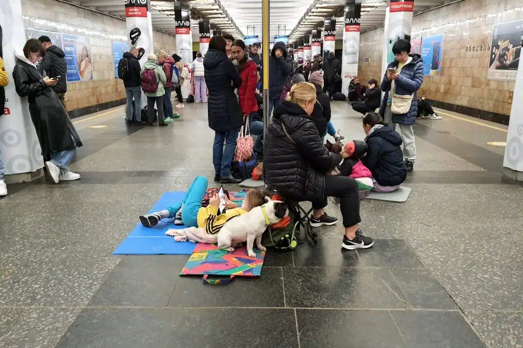 People hide in Kyiv subway during bombing of city by Russian rockets. Russia war against Ukraine, missile attacks against Ukrainian infrastructure, Kiev 2022-10-31