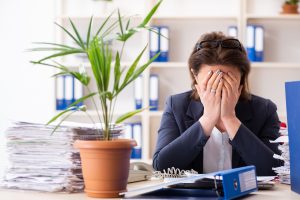 Middle-aged female employee being fired from her work