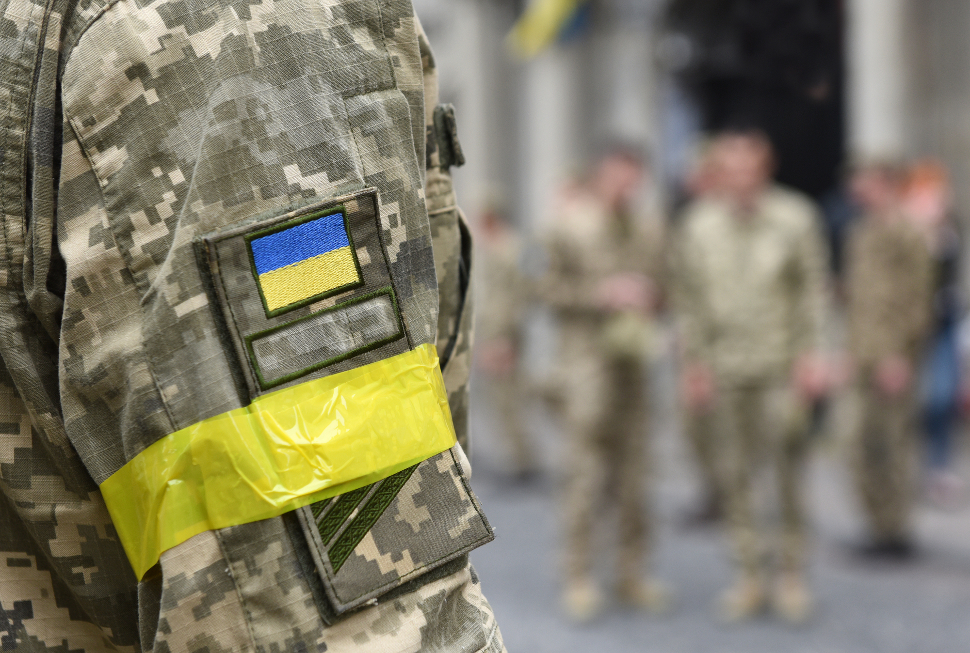 Armed Forces of Ukraine. Ukrainian soldier. Ukrainian army. Ukrainian flag on military uniform.