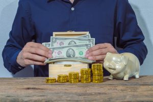 Business people save money for growth in business