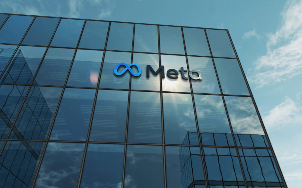 Menlo Park, USA, May 5, 2023: Meta corporation headquarters glass building concept. Metaverse facebook virtual reality network company symbol on front facade 3d illustration.
