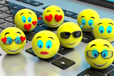Group of yellow emoticons on a laptop. 3d illustration