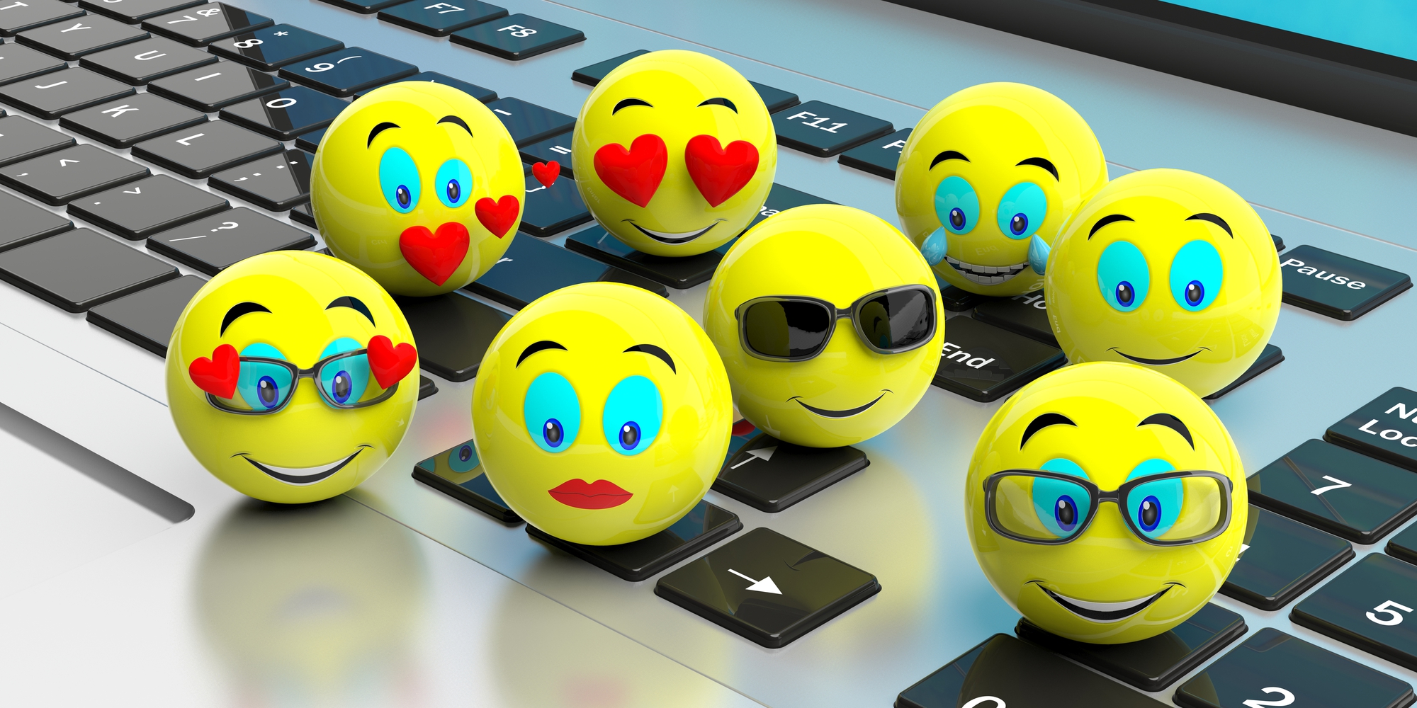 Group of yellow emoticons on a laptop. 3d illustration