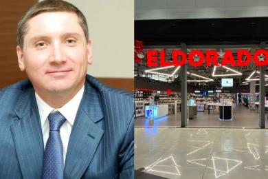 чоловік у костюмі і червона вивіска eldorado