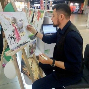 Відвідувач ТЦ розмальовує картину Brushme, 2017 рік / Фото Instagram brushme_studio