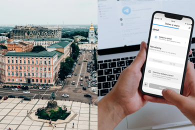 київ вид зверху, людина тримає телефон із застосунком київ цифровий